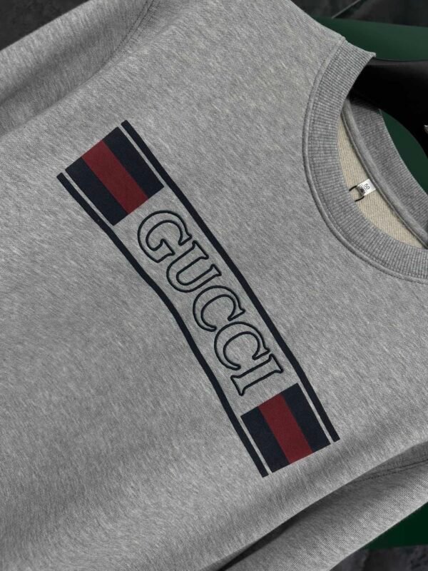 GCCI Crew Neck Jumper with Stripe Logo