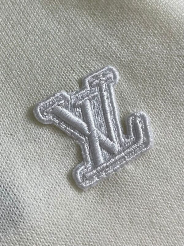 PHOTO-2025-11-30-10-55-40 LVE Monogram Sleeve Jumper – Ivory Knit