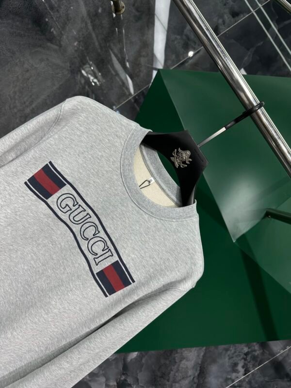 GCCI Crew Neck Jumper with Stripe Logo