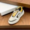 FND Low-Top Trainers with Subtle Yellow Accents - Grey/White