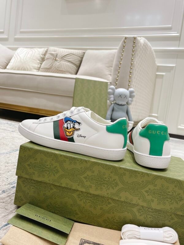 GCCI Trainers with Side Stripe and Embroidered Accent - White