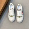 07a0f80a GCC White Trainers with Green Contrast Panels and Stripe Detail