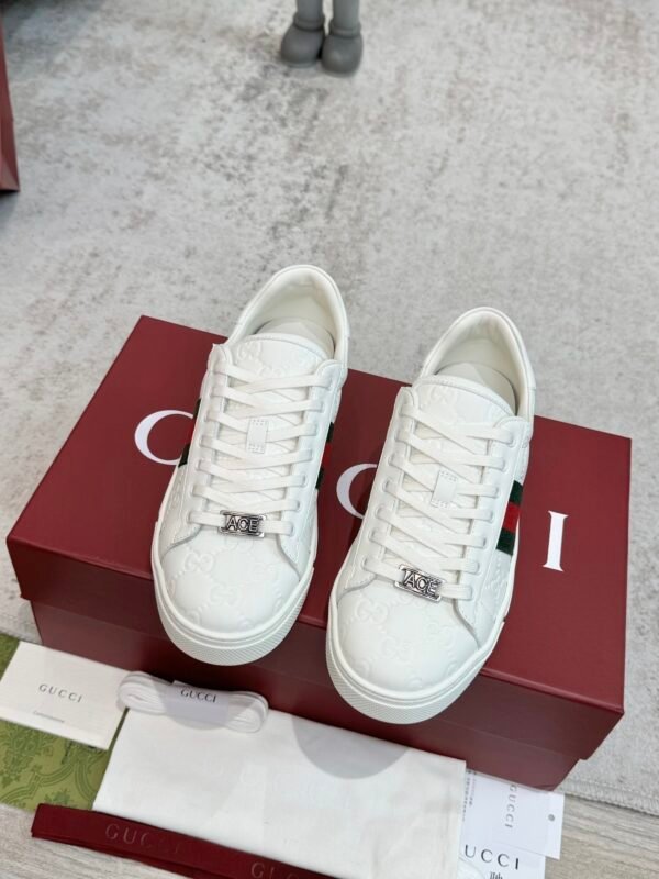 GCCI Trainers with Side Stripe and Embossed Pattern - White