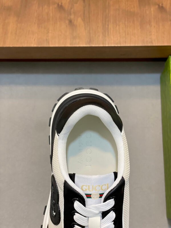 34ed46c0 GCCI Low-Top Trainers with Logo Patch - Black/Beige