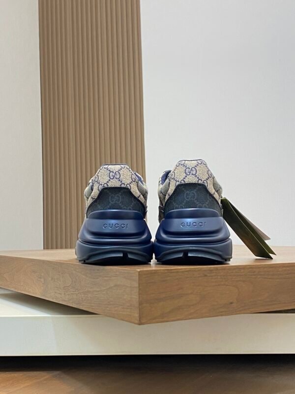 38992454 GCCI Trainers with All-Over Monogram Pattern - Navy/Beige