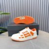 AMR Skel Leather Trainers – White with Orange Accents