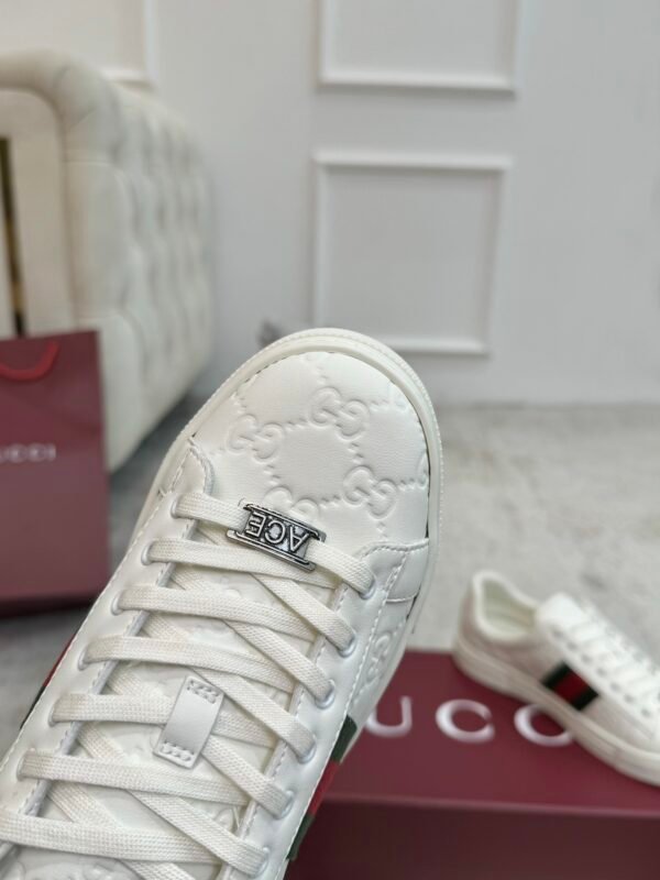 GCCI Trainers with Side Stripe and Embossed Pattern - White