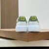 5616ff70 GCC White Trainers with Green Contrast Panels and Stripe Detail