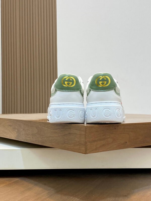 5616ff70 GCC White Trainers with Green Contrast Panels and Stripe Detail