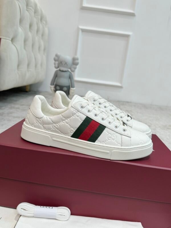 GCCI Trainers with Side Stripe and Embossed Pattern - White