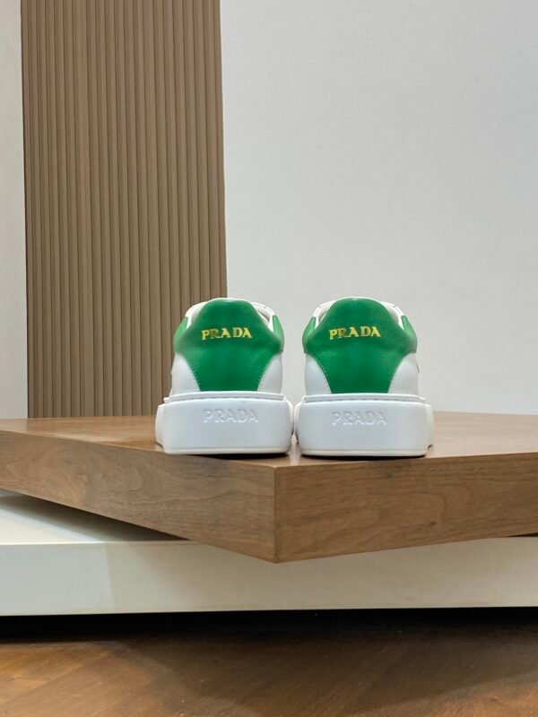 PRDA Low-Top Trainers in White with Green Heel Accents
