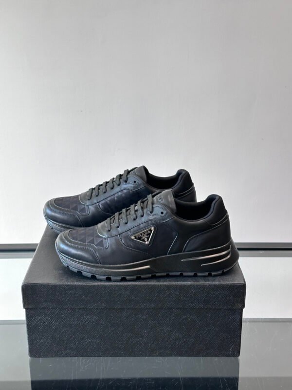 6594be26 PRDA Trainers with Black Geometric Panel Details
