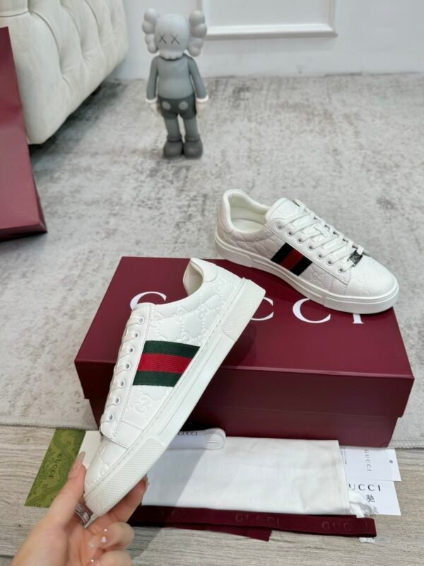 GCCI Trainers with Side Stripe and Embossed Pattern - White