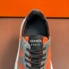 7 HRMS Suede Low-Top Trainers – Orange & Grey