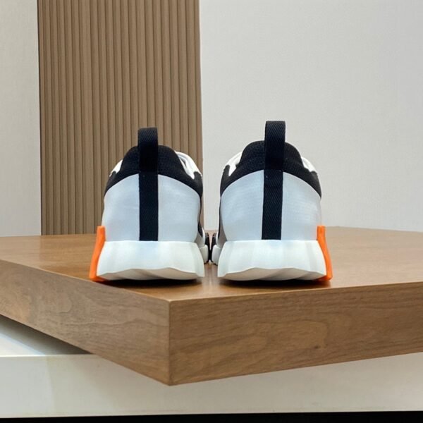 HRMS Mesh Low-Top Trainers – Black & White with Orange Detail