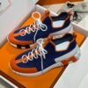 HRMS Knit & Leather Low-Top Trainers – Blue with Orange Stripe