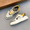 FND Low-Top Trainers with Subtle Yellow Accents - Grey/White