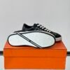 HRMS Boomerang Leather Trainers – Black with White Accents