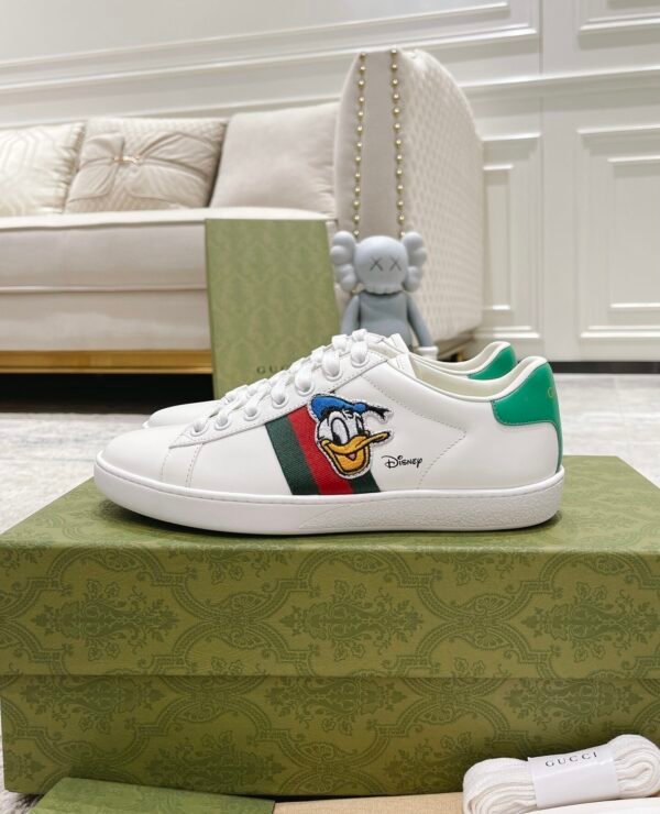 GCCI Trainers with Side Stripe and Embroidered Accent - White