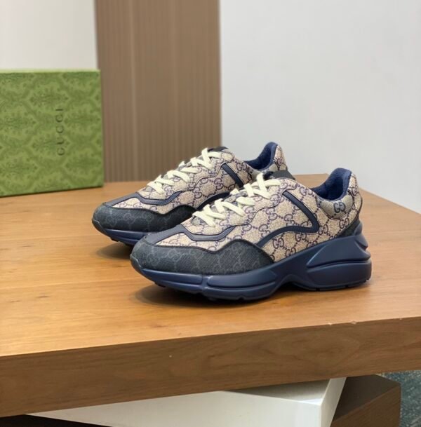9c7ce553 GCCI Trainers with All-Over Monogram Pattern - Navy/Beige