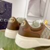 GCCI Low-Top Monogram Trainers - Brown