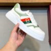 a17303b2 GCC White Trainers with Green Contrast Panels and Stripe Detail