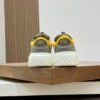 FND Low-Top Trainers with Subtle Yellow Accents - Grey/White