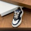 FND Low-Top Trainers with Subtle Brown Accents - Navy/White