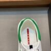 PRDA Low-Top Trainers in White with Green Heel Accents