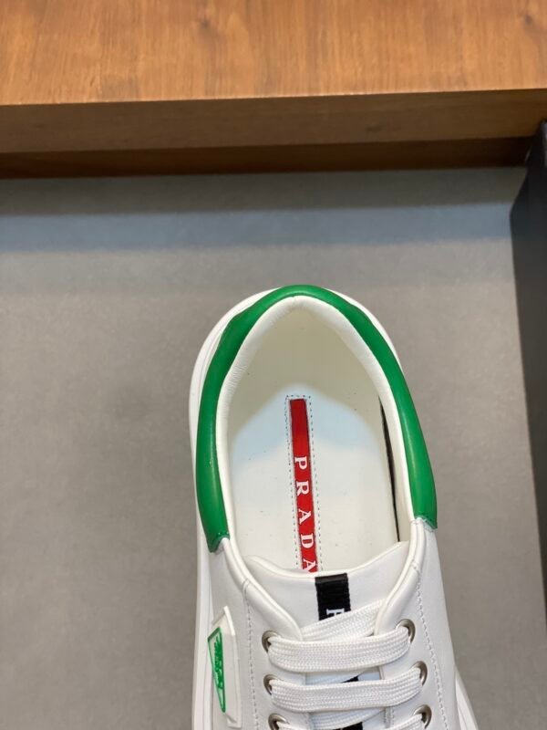 PRDA Low-Top Trainers in White with Green Heel Accents