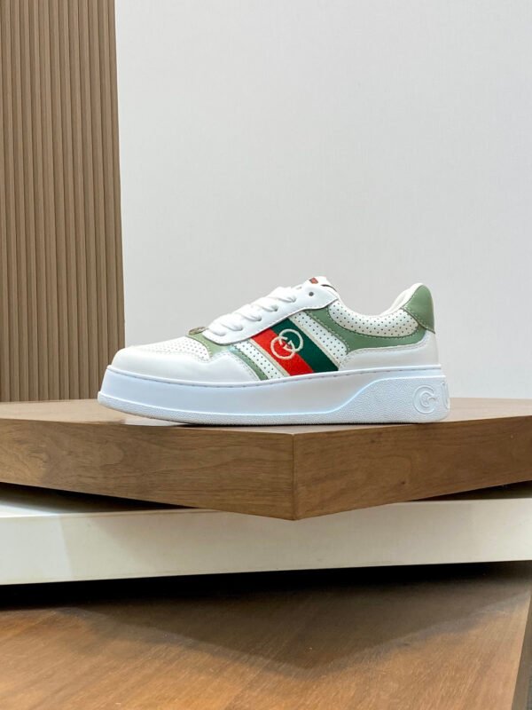 c6b64ddf GCC White Trainers with Green Contrast Panels and Stripe Detail
