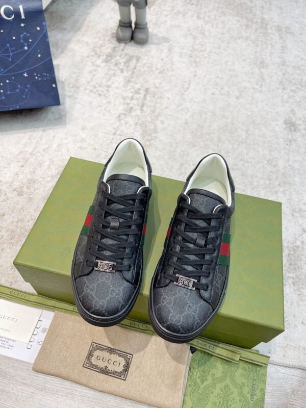 cc9104e1 GCCI Monogram Trainers with Side Stripe - Black