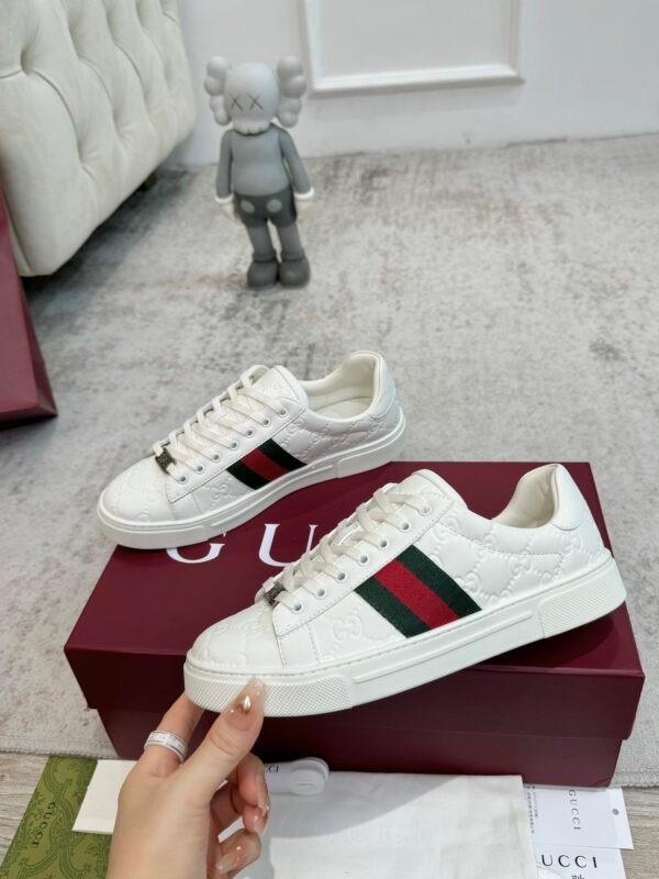 GCCI Trainers with Side Stripe and Embossed Pattern - White