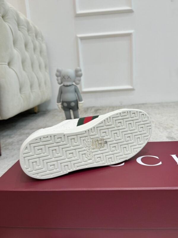 GCCI Trainers with Side Stripe and Embossed Pattern - White