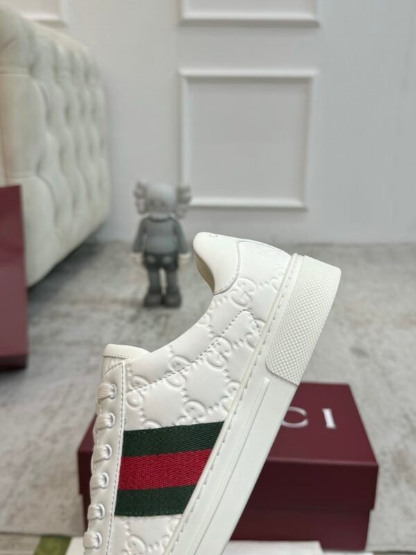 GCCI Trainers with Side Stripe and Embossed Pattern - White