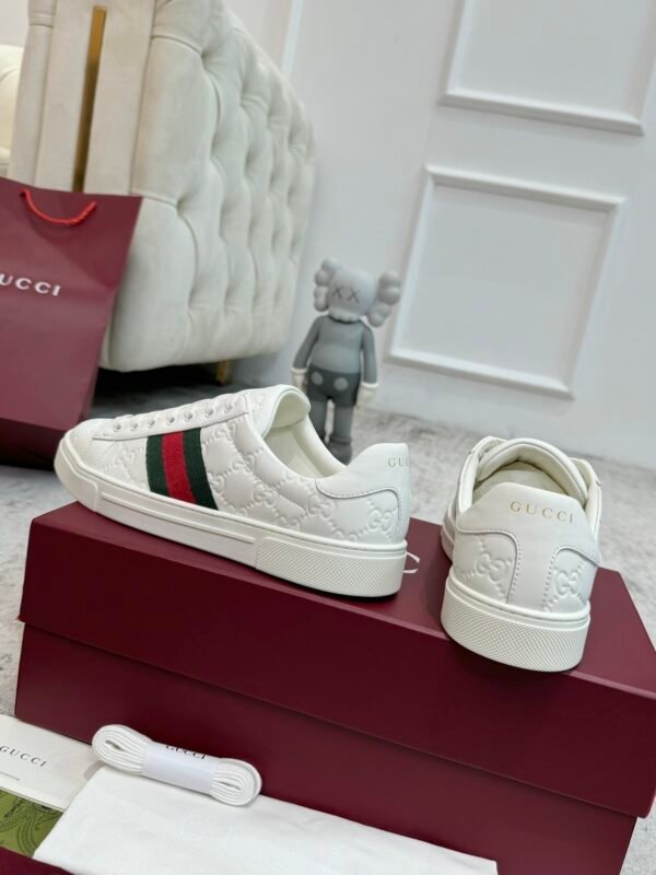 GCCI Trainers with Side Stripe and Embossed Pattern - White